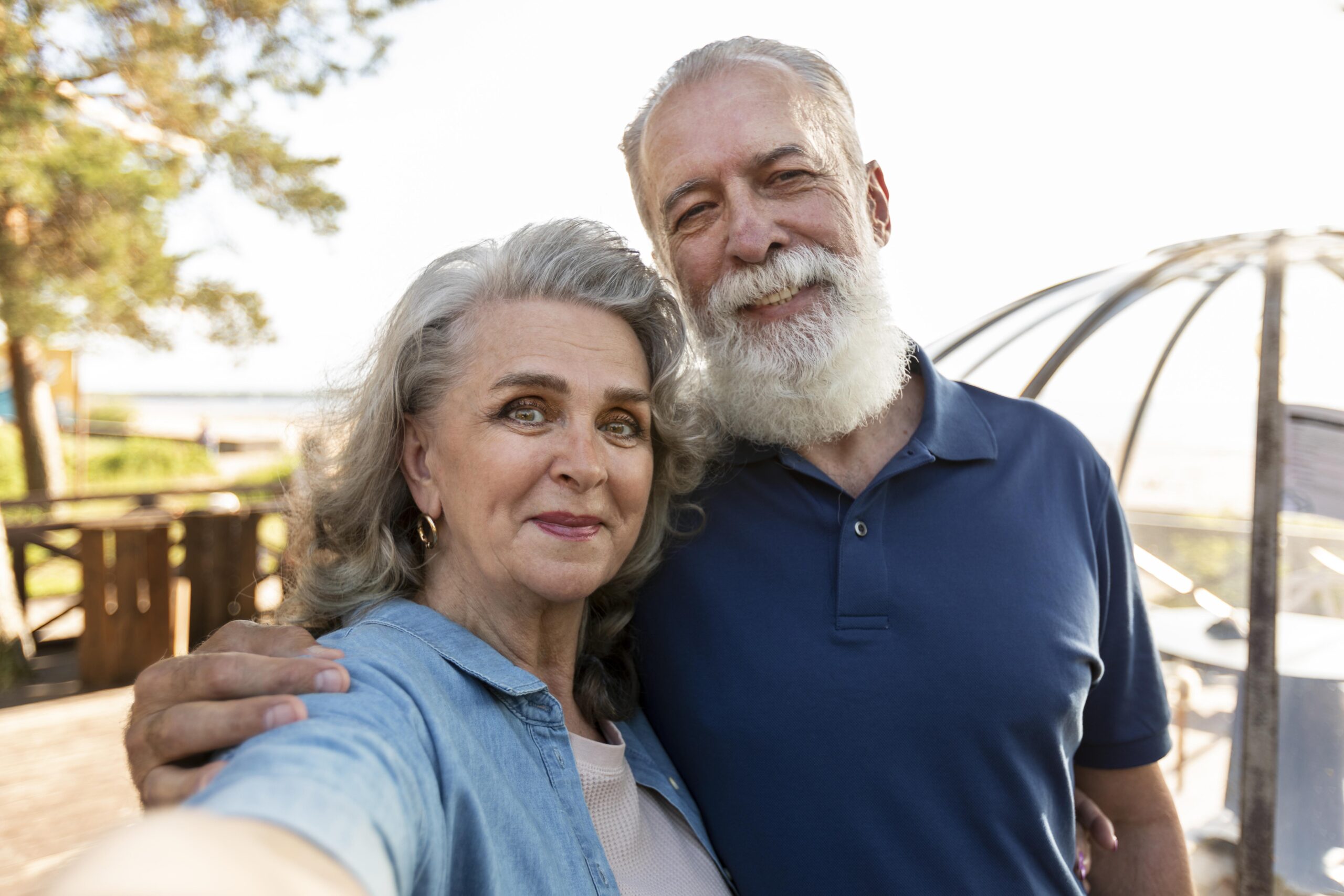 smiley-couple-taking-selfie-medium-shot